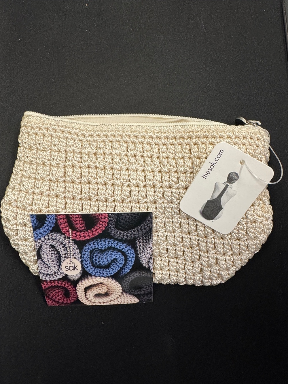 The Sak Cream Woven Zip Clutch